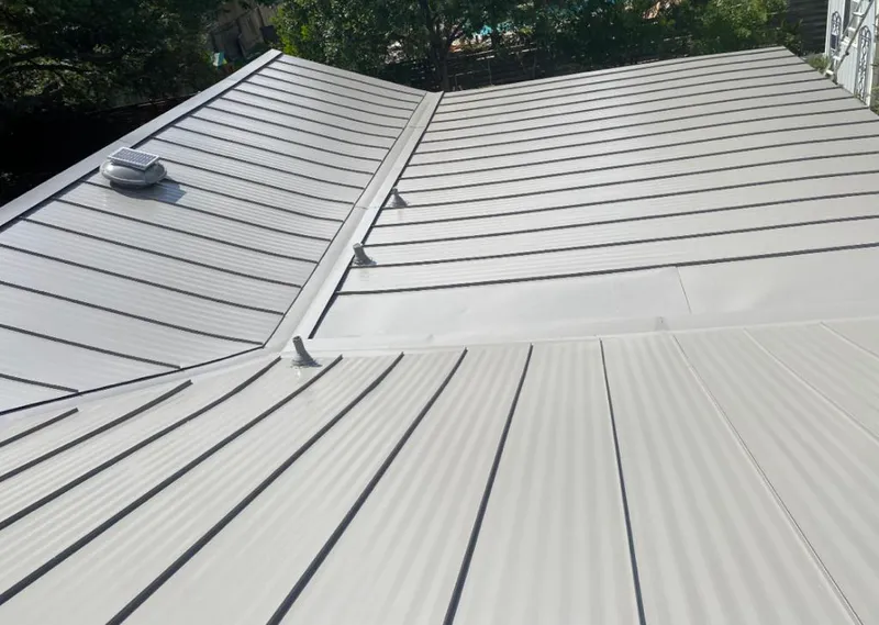 Solar attic fan installed on a metal roof for Roof Ventilation in Kahaluu-Keauhou